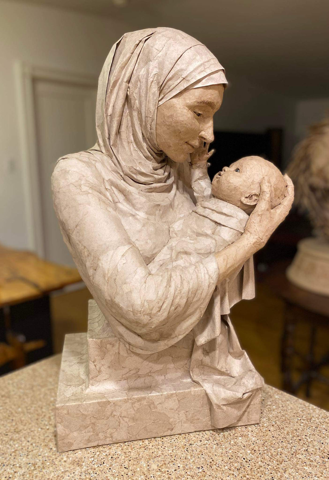 "The Bond" – A Touching Mother and Child Cardboard Sculpture by Sue Beatrice