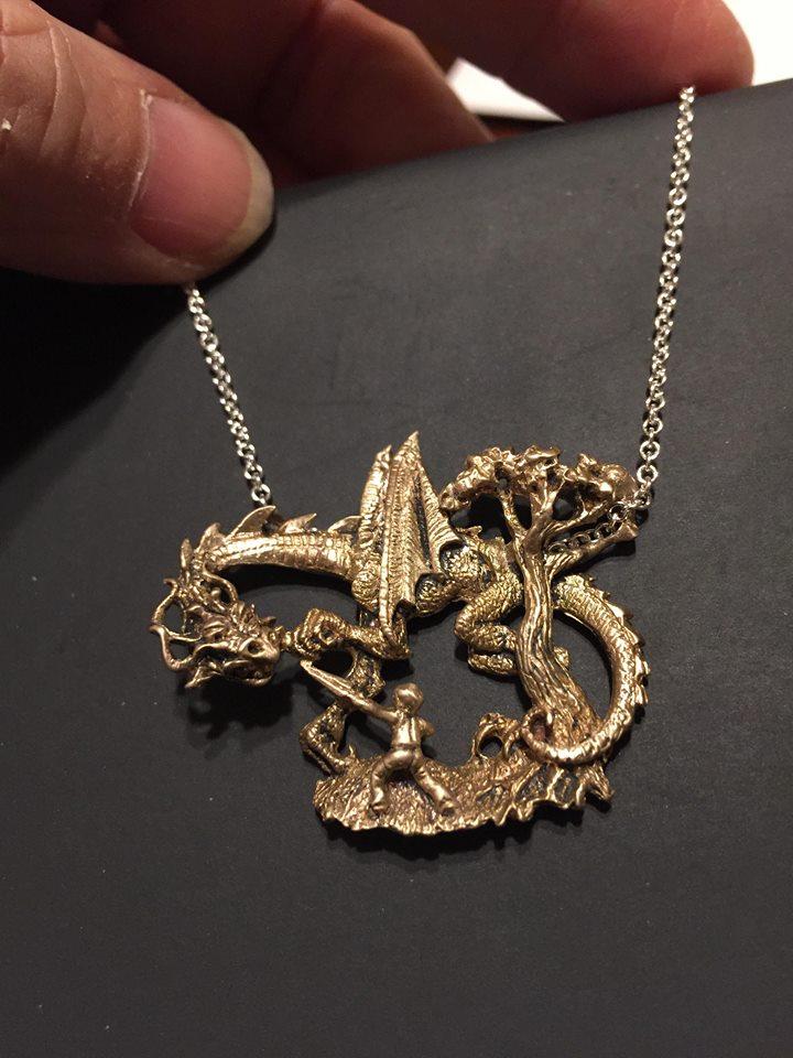 Jabberwock Necklace: Handcrafted Dragon-inspired Jewelry in Bronze.
