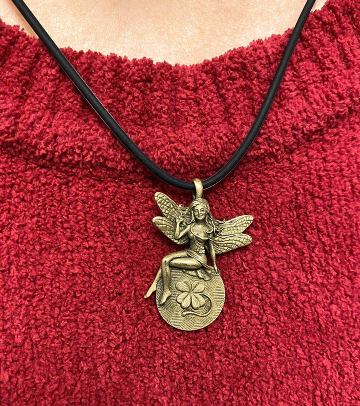 Lucky Lady Lottery Fairy: Gold-toned charm with a wink, crossed fingers, & twin four-leaf clovers. Doubles as a scratch-off coin.
