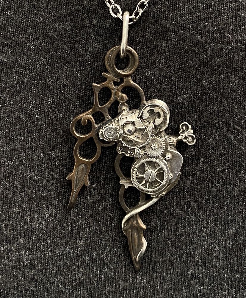 Timeless Whimsy: Sterling Silver Mouse Pendant