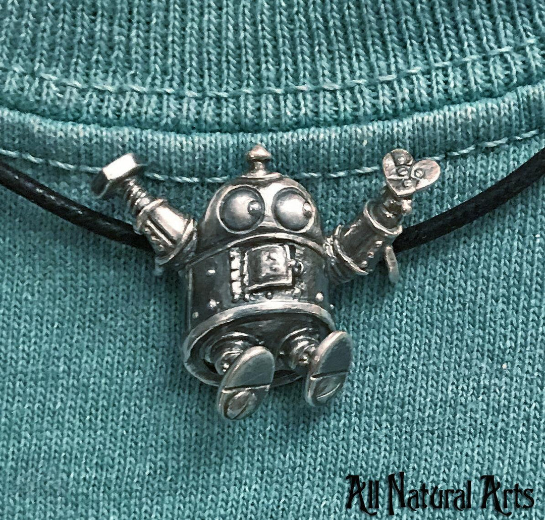 Sue Beatrice's robot pendant with heart exposed, symbolizing shared data and everlasting affection.
