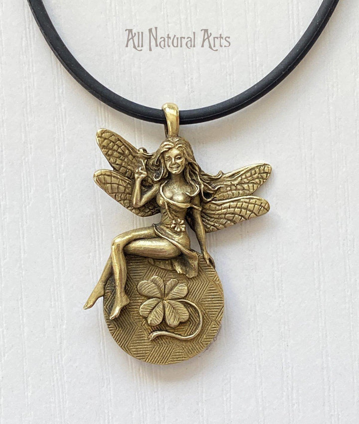 Lucky Lady Lottery Fairy: Gold-toned charm with a wink, crossed fingers, & twin four-leaf clovers. Doubles as a scratch-off coin. 