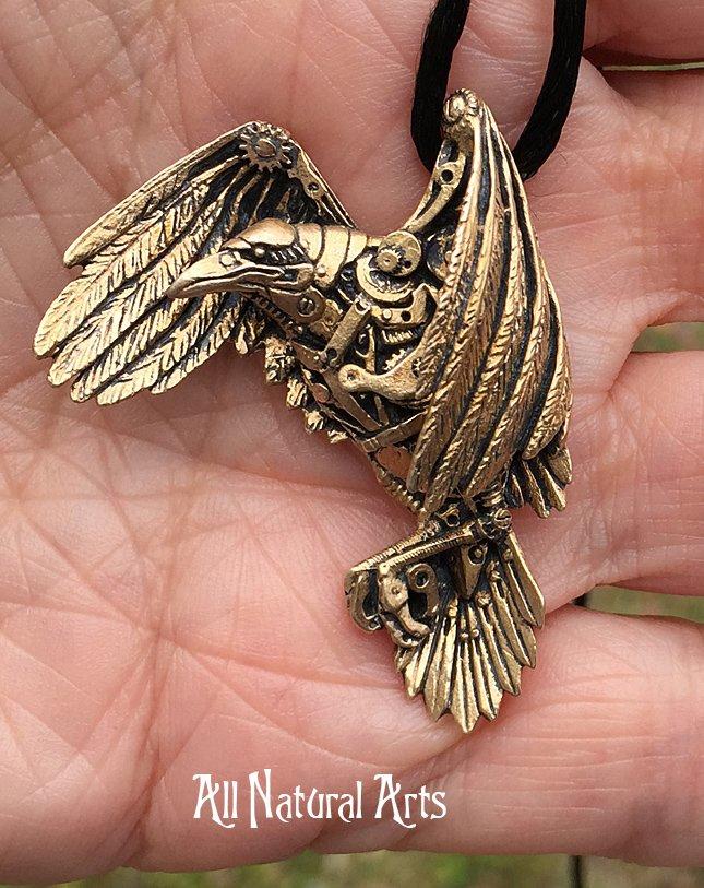 Bronze Raven necklace carved in wax with watch parts added for an industrial look. 