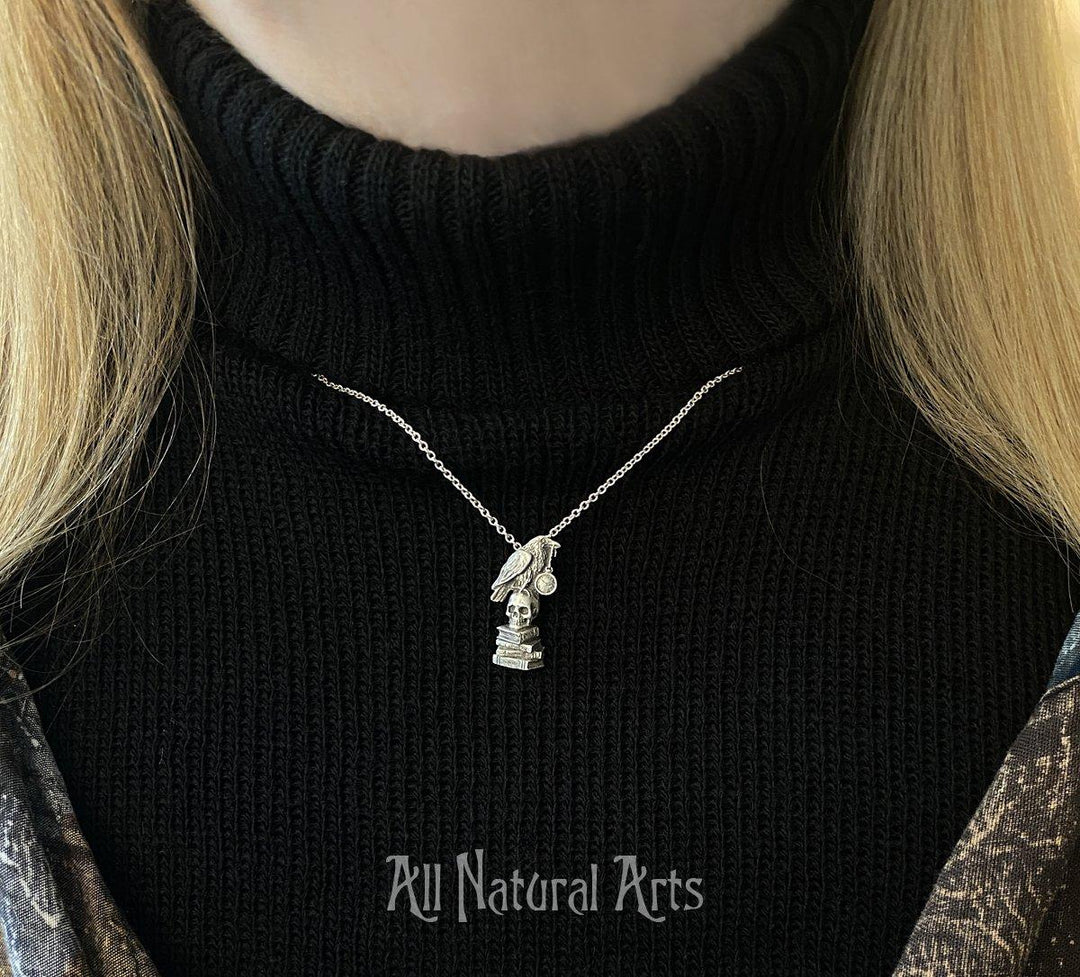 Delicate Raven pendant inspired by Edgar Allan Poe - literary jewelry by Sue Beatrice. Handcrafted sterling silver necklace.