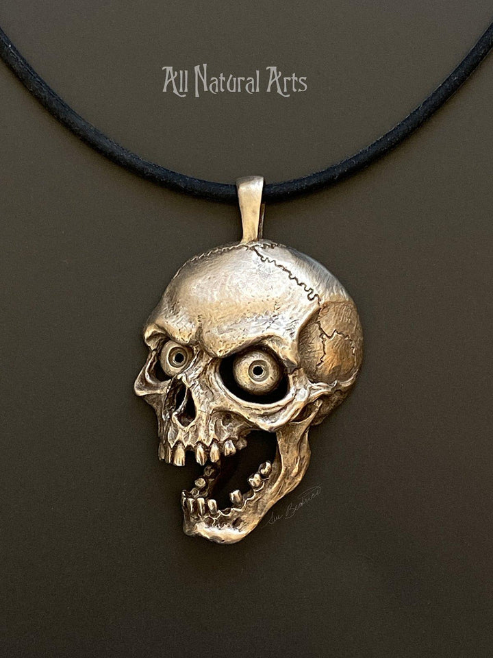 Screaming Skull pendant - bronze accessory with macabre design on black cord