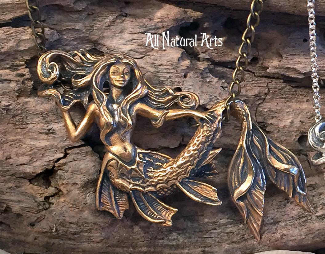Close up of Sea Dragon Mermaid Necklace: Hand Carved Bronze Pendant by Sue Beatrice