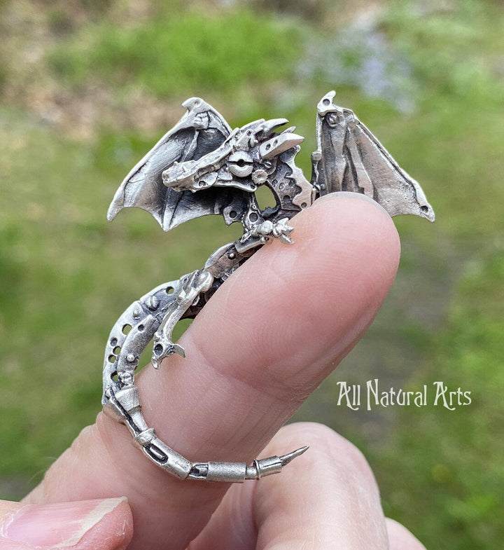 Silver Finger Dragon perched on a finger | Mythical jewelry that captivates the imagination.