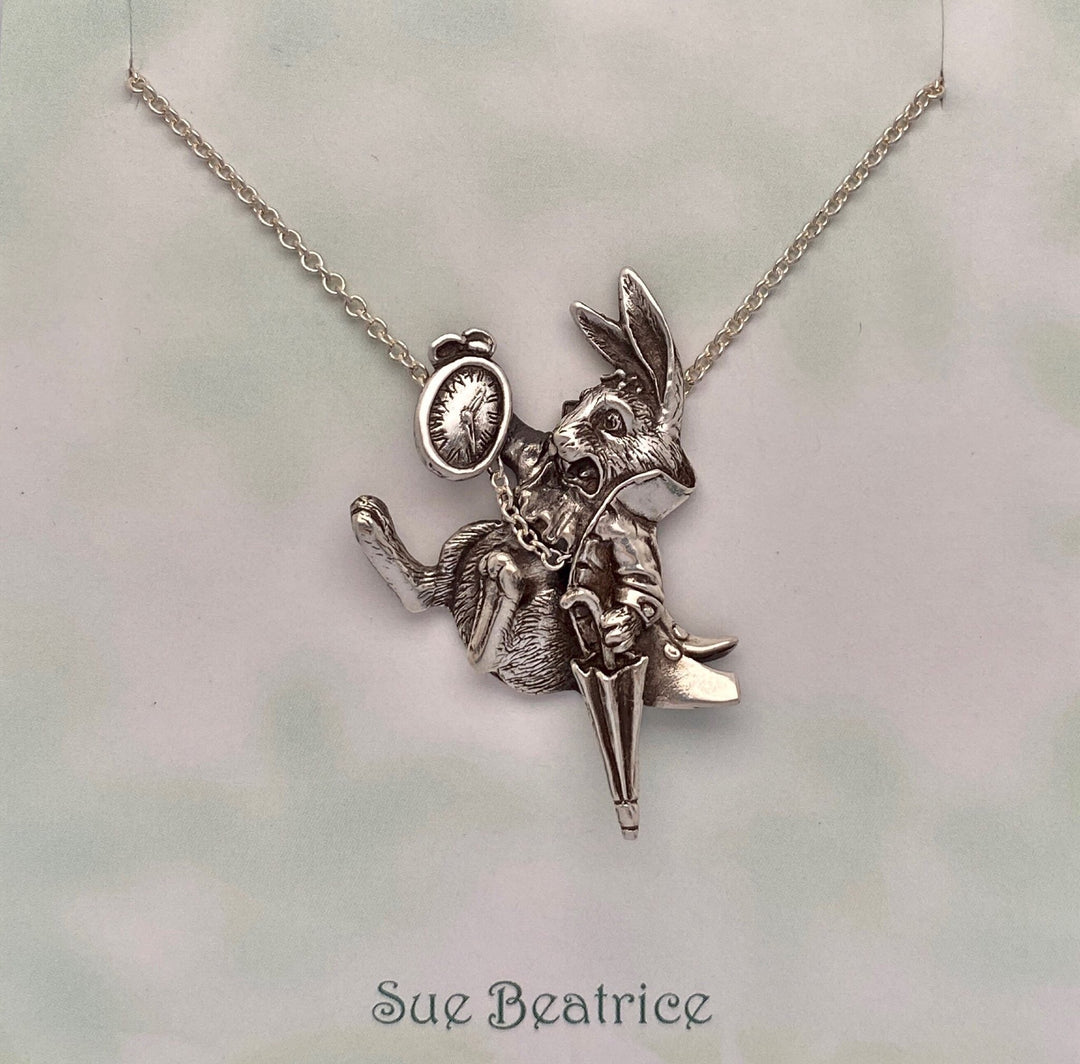 Handcrafted sterling silver necklace: The White Rabbit pendant by Sue Beatrice. Whimsical design with an interactive feature.