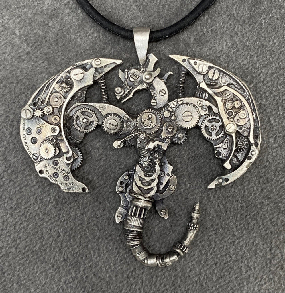 Handmade 'Gotham' Dragon Pendant by Sue Beatrice, made from vintage pocket watch parts, exuding antique elegance and cast in sterling silver.